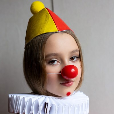 Girl in Clown Costume