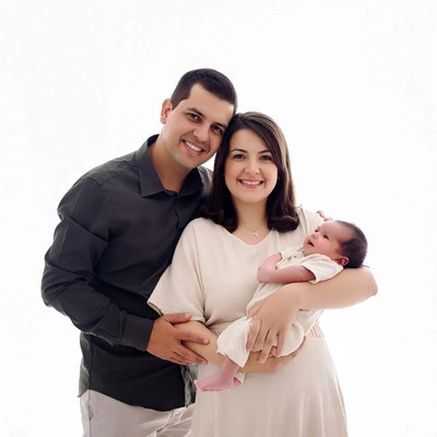 Family holding newborn baby