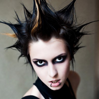 Woman with punk mohawk hairstyle