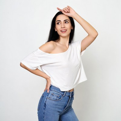 Woman pointing up with hand on hip