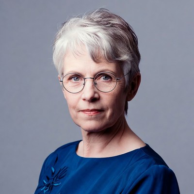 Elderly woman with short gray hair