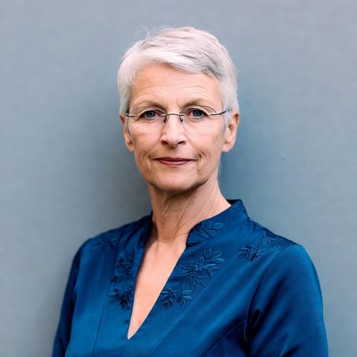 Elderly woman with short white hair