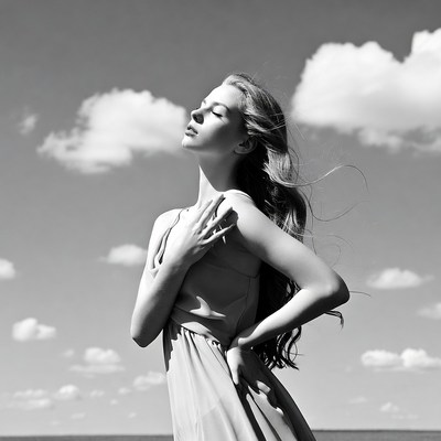 Blonde woman with hand on chest outdoors