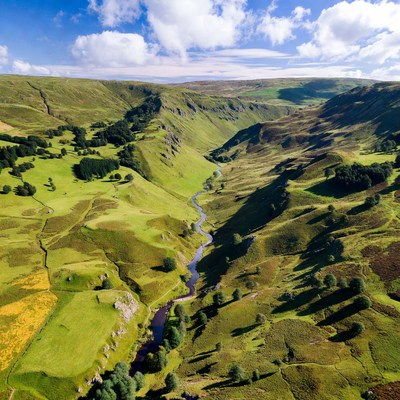 Aerial View of Lush Green Valley River