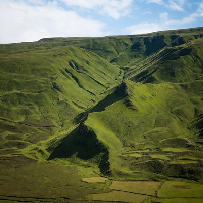 Lush Green Rolling Hills Landscape