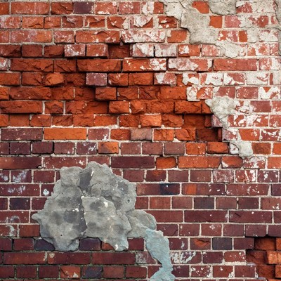 Red Brick Wall with Peeling Plaster