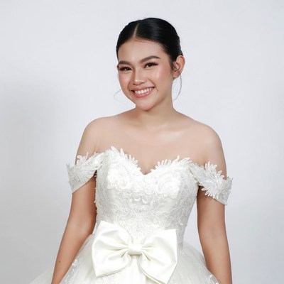 Asian woman in white wedding dress