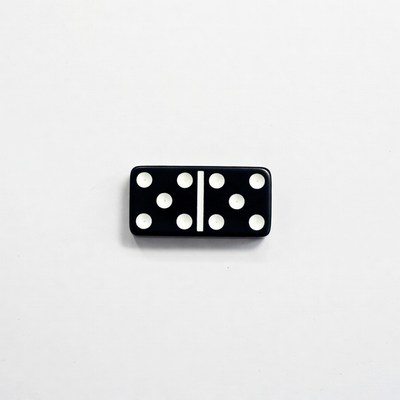 Double-six black domino tile