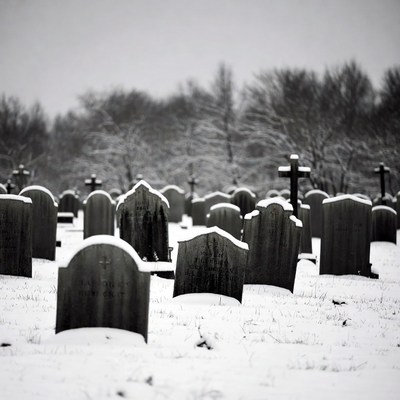 Snowy Cemetery with Gravestones