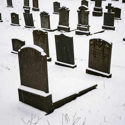 Snowy Cemetery with Gravestones