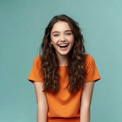 Smiling girl with wavy brown hair