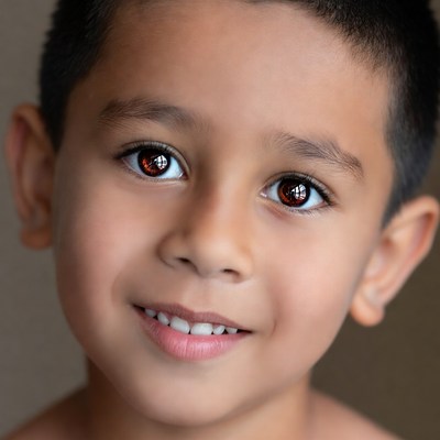 Smiling Asian boy close-up
