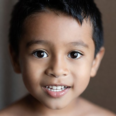 Smiling Asian boy close-up