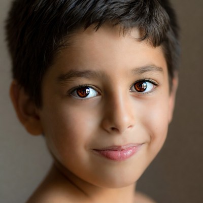 Smiling young boy close-up portrait