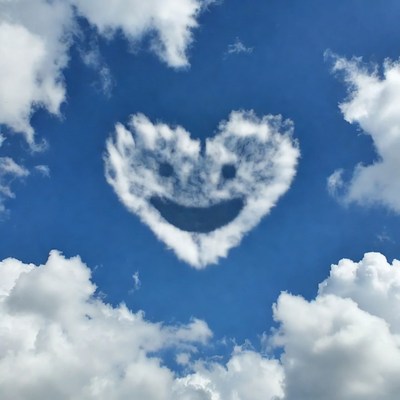 Heart-shaped Smiling Cloud in Blue Sky