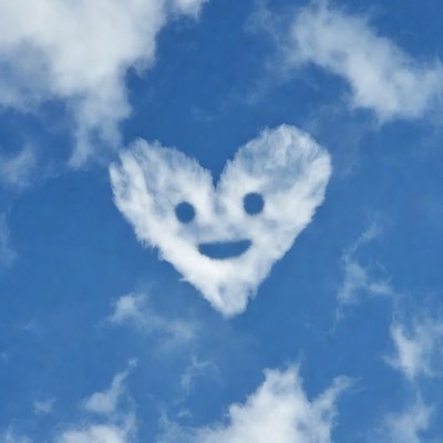Smiling Heart Cloud in Blue Sky