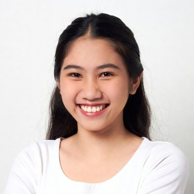 Smiling Asian girl on white background