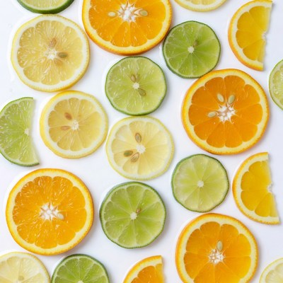 Lime and Orange Slices on White