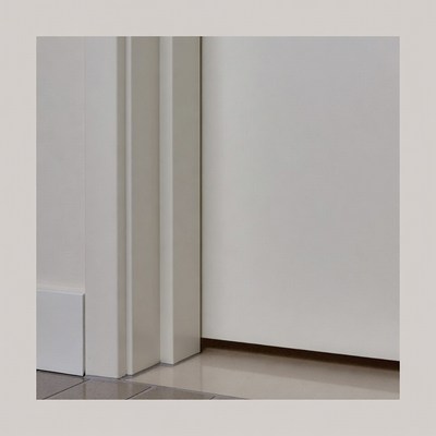 White Door Frame on Gray Floor