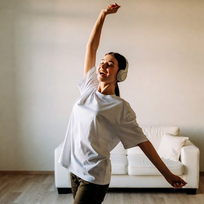 Woman dancing with headphones