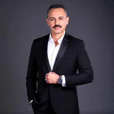 Man in black tuxedo with mustache