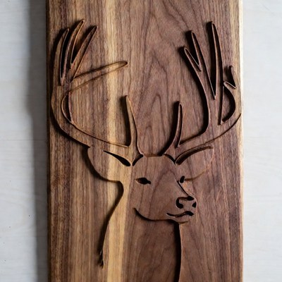 Wooden carved deer head