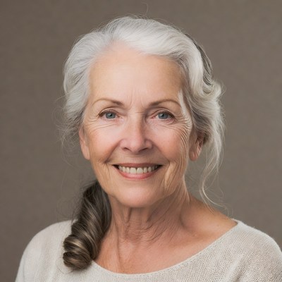 Smiling elderly woman with ponytail
