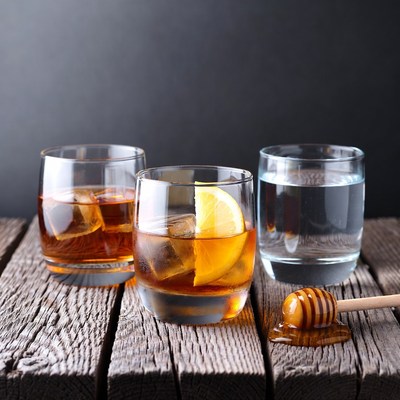 Whiskey with Lemon and Honey Dipper