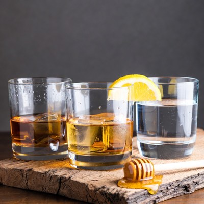 Three Glasses with Whiskey Water Honey