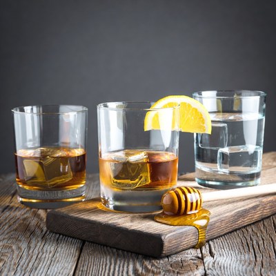 Whiskey Glasses with Honey and Lemon