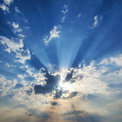 Sun rays through clouds