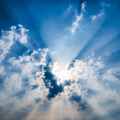 Bright Sun Rays Through Clouds