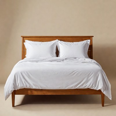 Wooden bed with white bedding