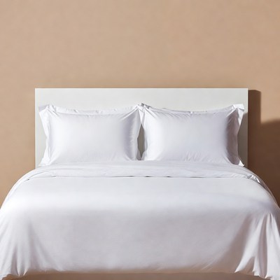White Bed Sheets on Bed