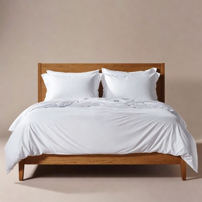 White Bedding on Wooden Bed