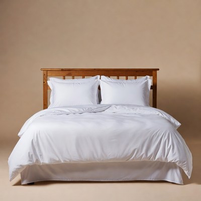 White Bedding on Wooden Bed Frame