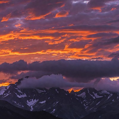 Sunset over Snowy Mountains
