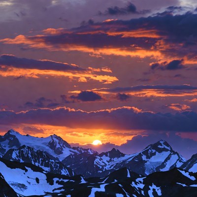 Sunset over Snowy Mountains