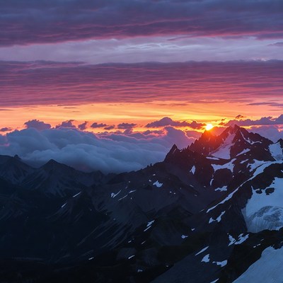 Sunset over Snowy Mountains