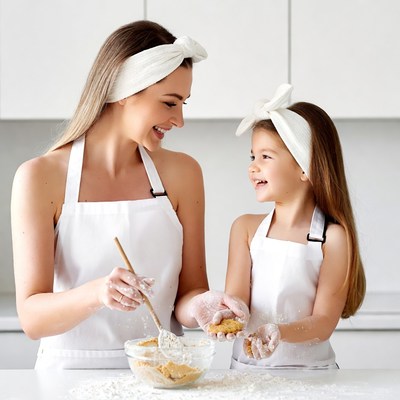 Mother and daughter baking cookies