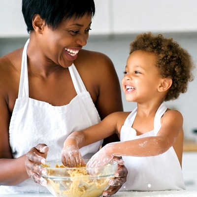 Mother and child baking cookies
