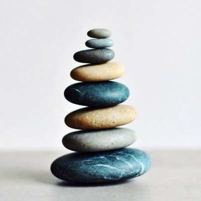 Stacked Pebbles on White Background