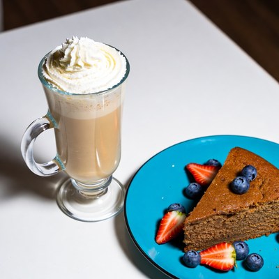 Latte with Whipped Cream and Blueberry Cake