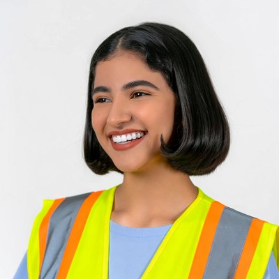 Smiling woman in yellow safety vest