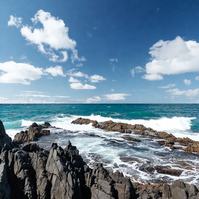 Ocean waves crashing on rocky shore