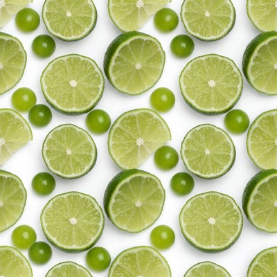 Fresh lime slices and whole limes