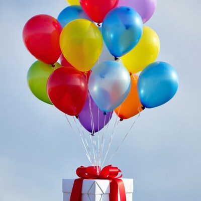 Colorful Balloons on Gift Box