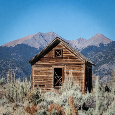 Abandoned Wooden Cabin in Mountains