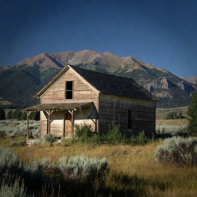 Abandoned Wooden Cabin in Mountains