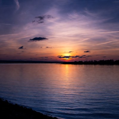 Sunset over calm lake